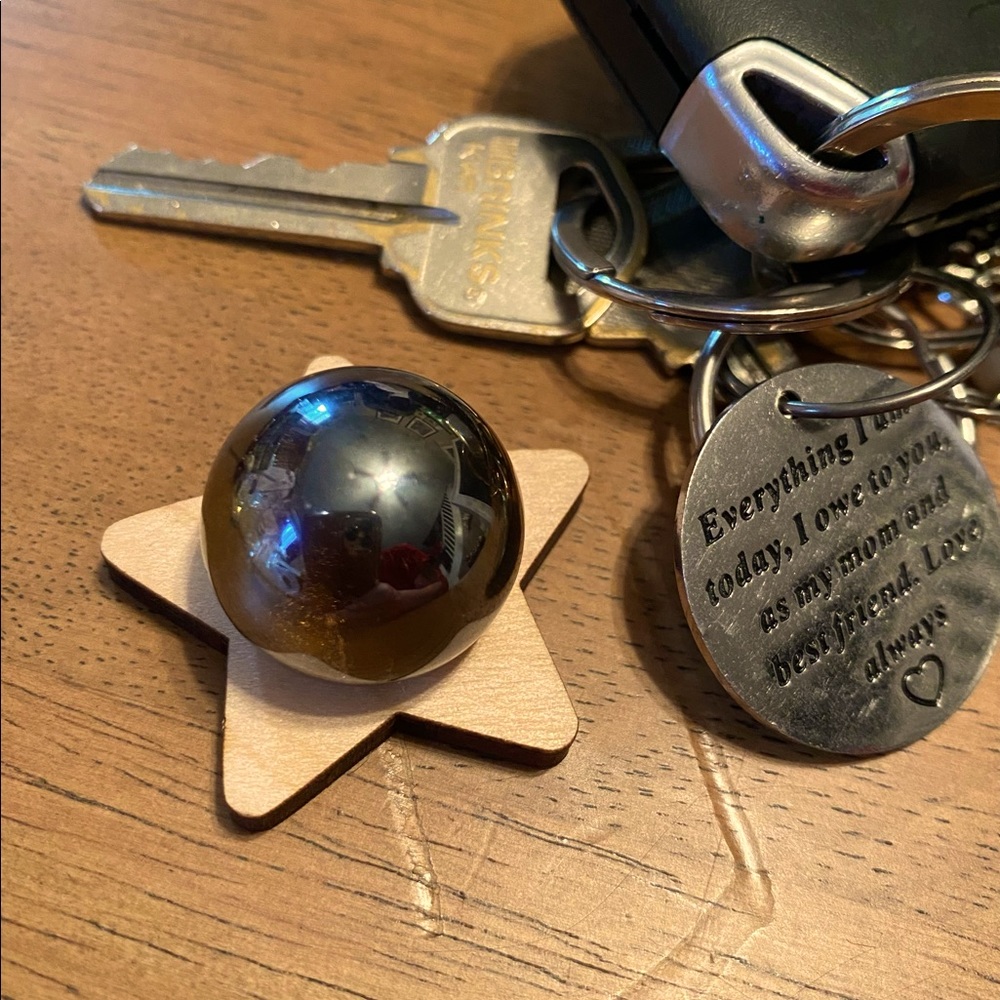 Small sphere with holder